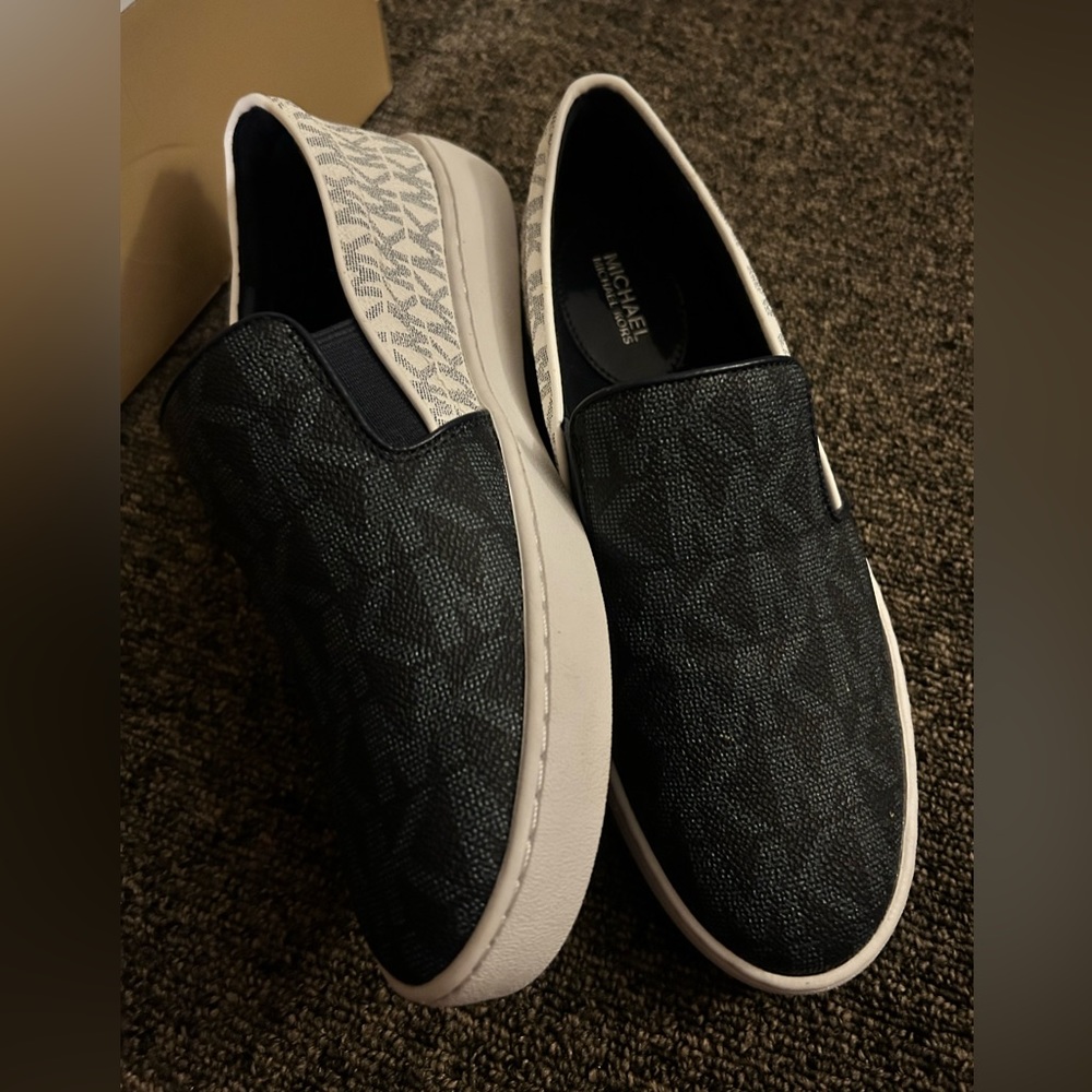 Micheal Kors slip ons (brand new/never worn!)